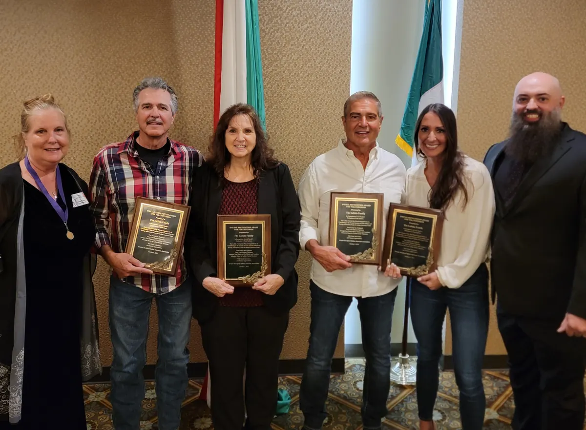 Receiving the Special Recognition Award for Volunteerism